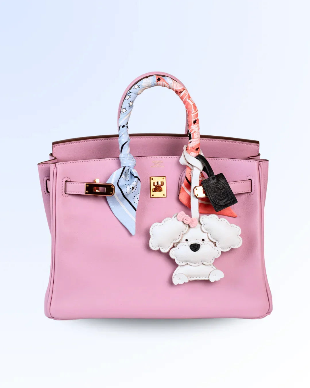 White poodle goatskin leather bag charm on luxury handbag