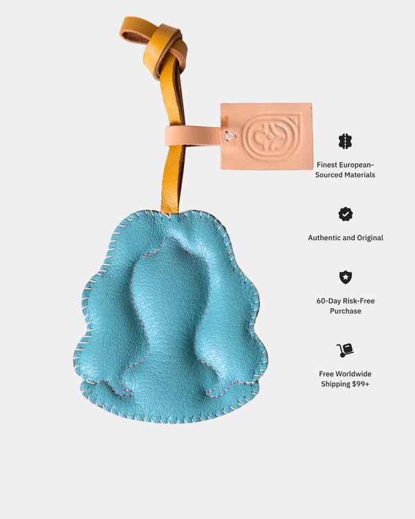 Blue leather product with a yellow strap on a white background, featuring brand logo and text.