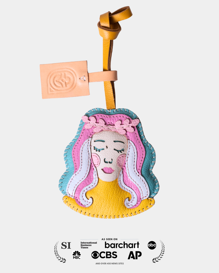 Colorful keychain with a face design on a white background